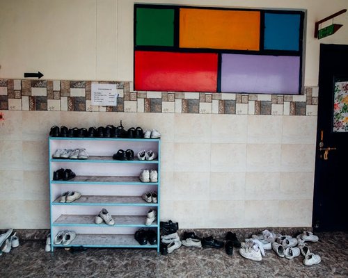 Shoe rack by the entrance